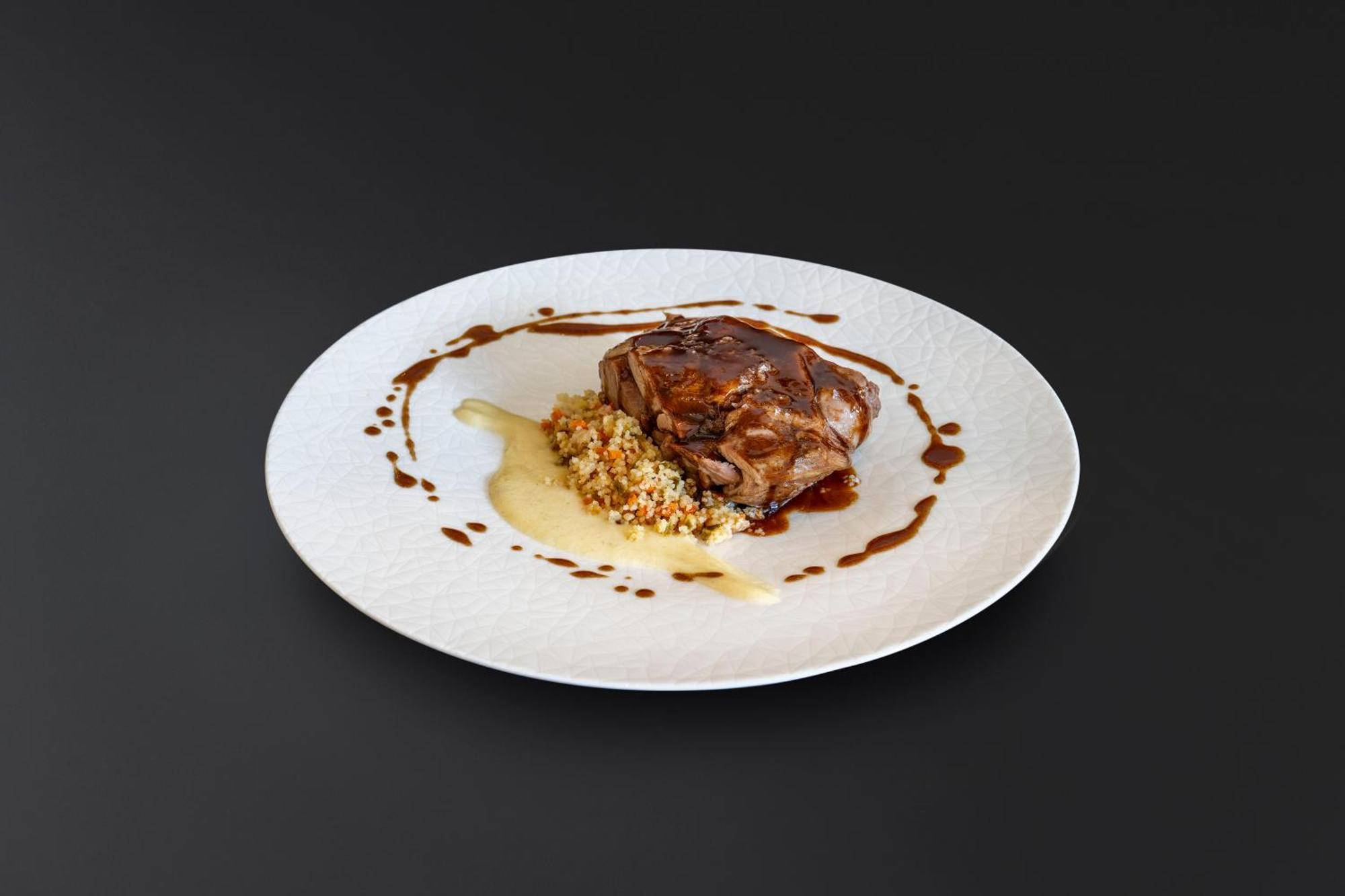 Aurea Washington Irving By Eurostars Hotel Company Granada Exterior photo A plate of braised lamb